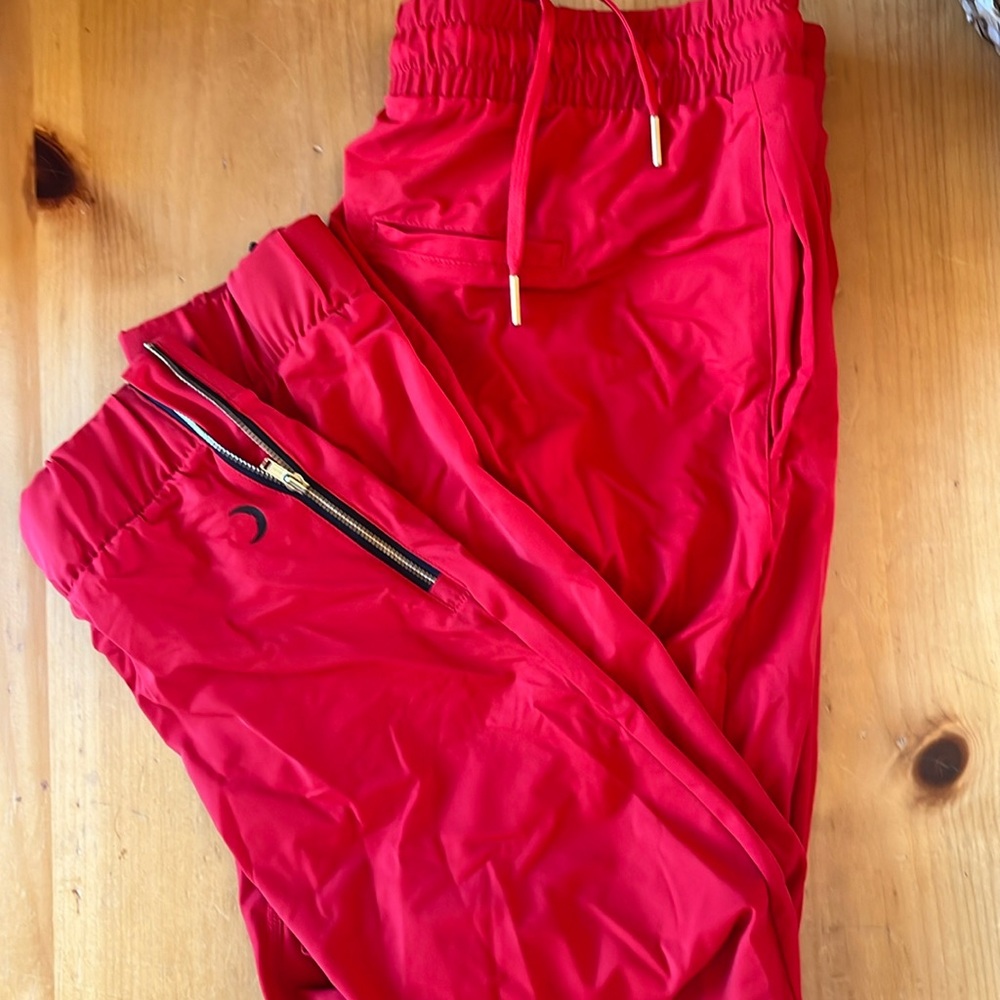 Zyia Everywhere joggers. Red. Gold zippers. Front pockets, draw-string waste